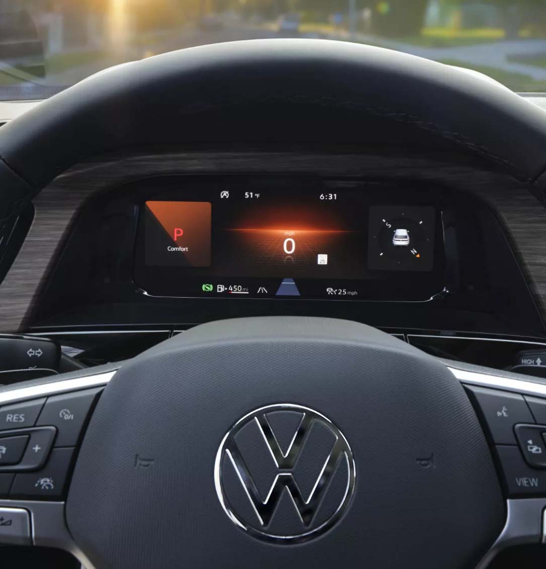 A close-up view of the digital cockpit pro display (visible behind the steering wheel)